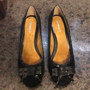 Black suede shoe with small wedge